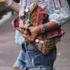 Heres How to Carry a Fabulous Clutch Purse Anywhere You Go ...