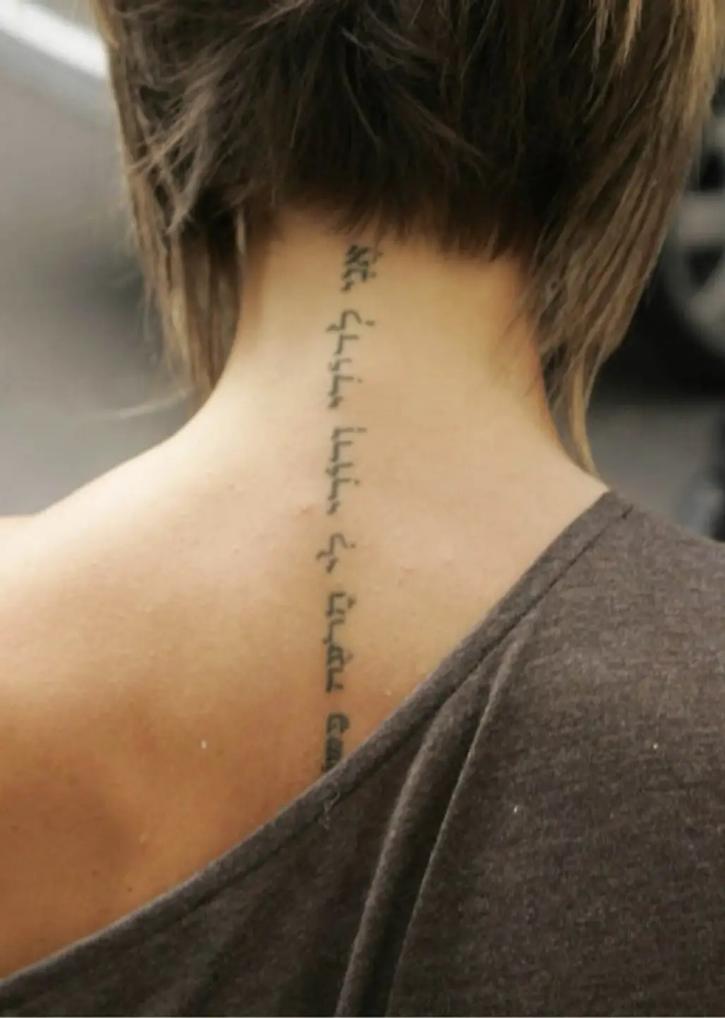Victoria Beckham’s Spine Tattoo