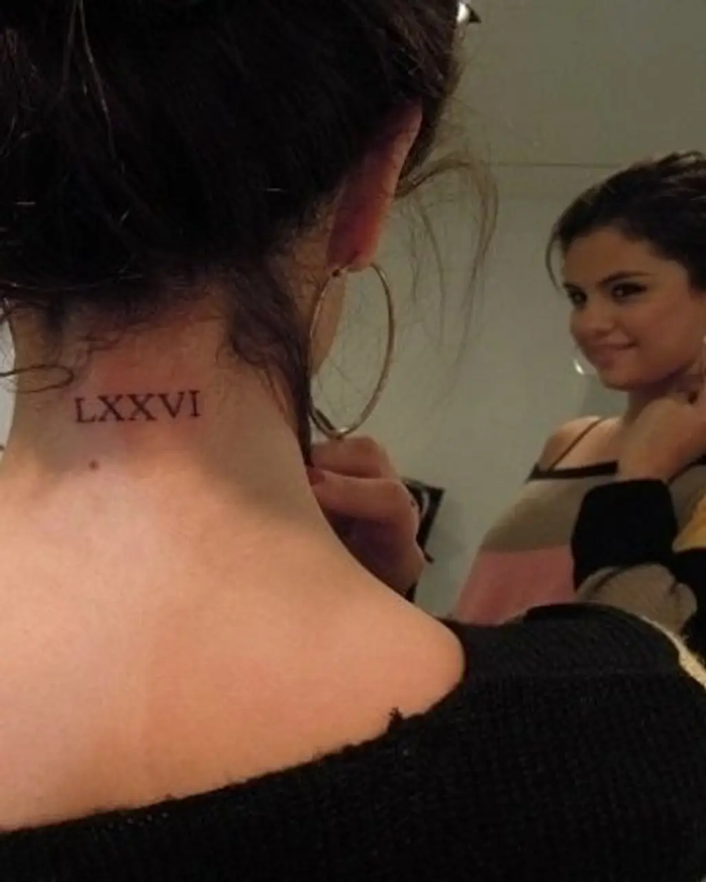 Selena Gomez’s Roman Numerals Tattoo