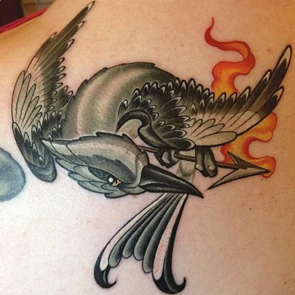 10 Die-Hard 'Hunger Games' Fans and Their Crazy Tattoos (PHOTOS)