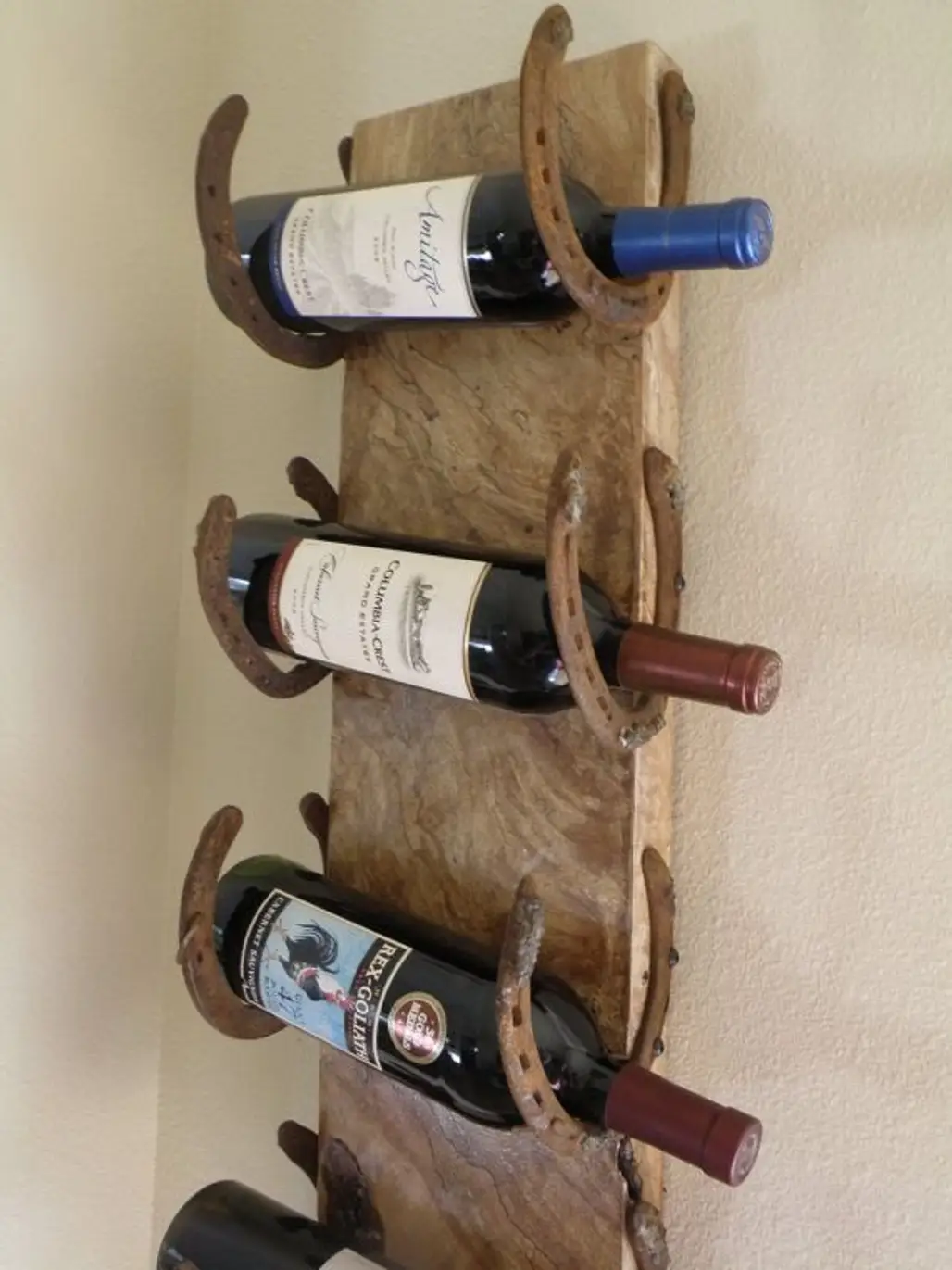man made object,weapon,product,wine bottle,longboard,
