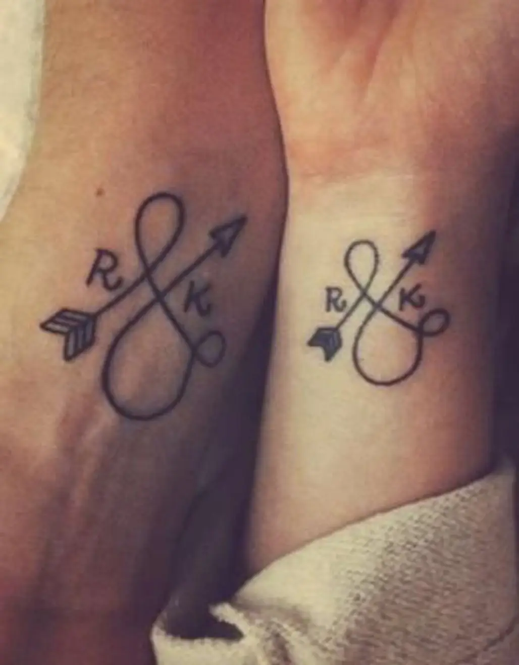 tattoo,arm,finger,hand,leg,