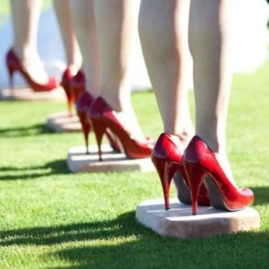 Give Your Bridesmaids Cement Blocks to Stand on so They Don’t Sink into the Grass