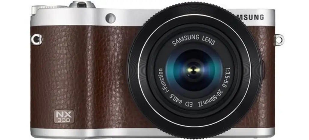 NX300 20.3MP CMOS Smart WiFi Compact Interchangeable Lens Digital Camera with 20-50mm Lens and 3.3" AMOLED Touch Screen (Brown)