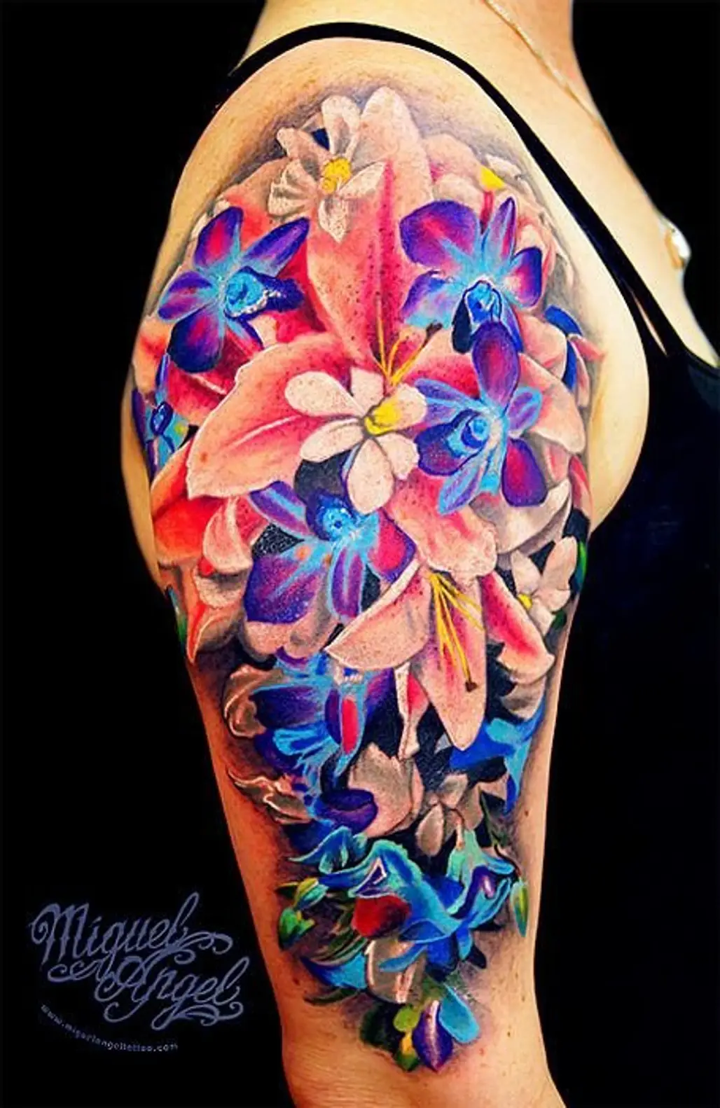 tattoo,arm,organ,flower,hand,