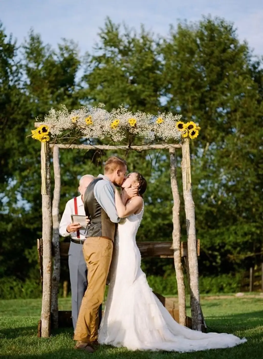 DIY Arbor with Sunflowers and Baby’s Breath