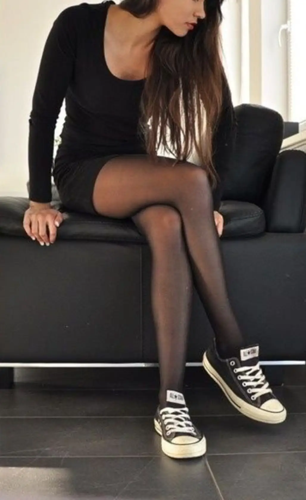 Wearing Flat Sneakers Accentuates Your Toned Legs, Especially when Paired with Stockings