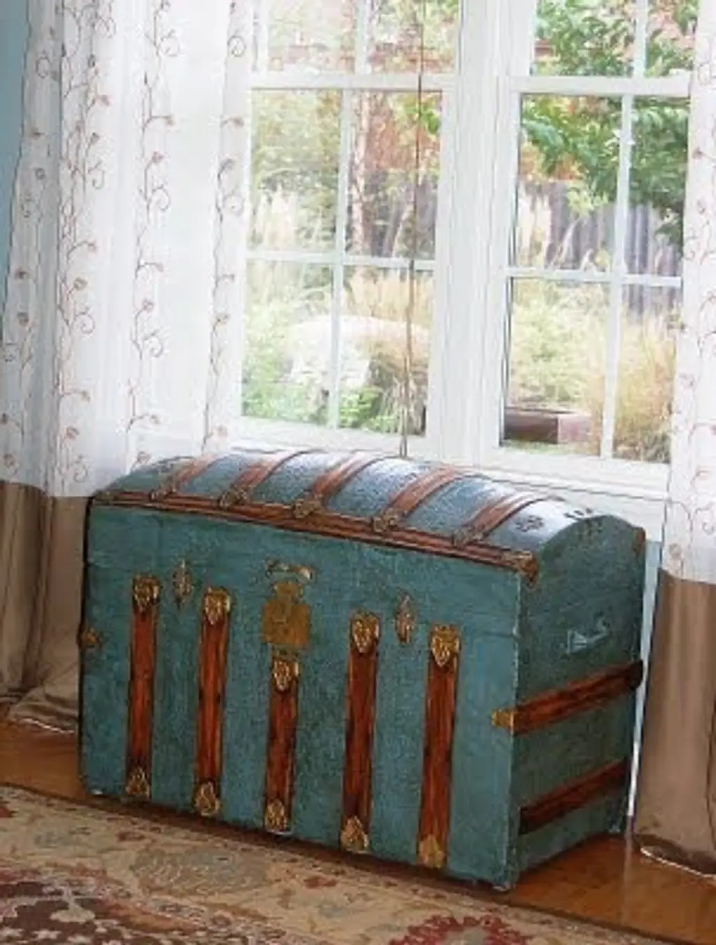 Use a Wonderful Old Trunk to Liven up a Window