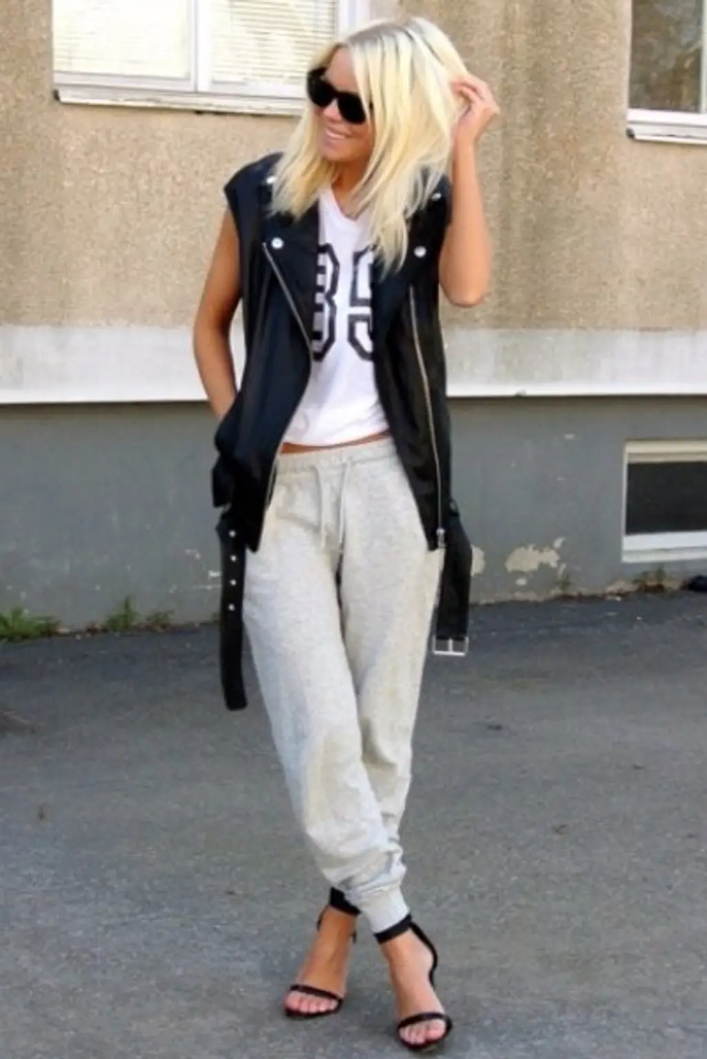 Mix Your Track Pants with a Vest and Heels