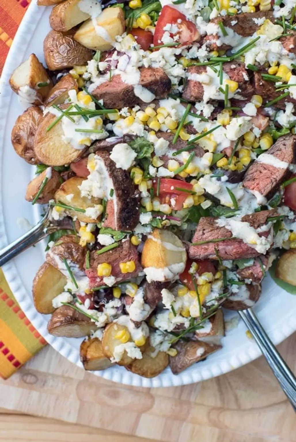 Hearty Salad is Packed Full of Steak, Roasted Potatoes, and Grilled Corn