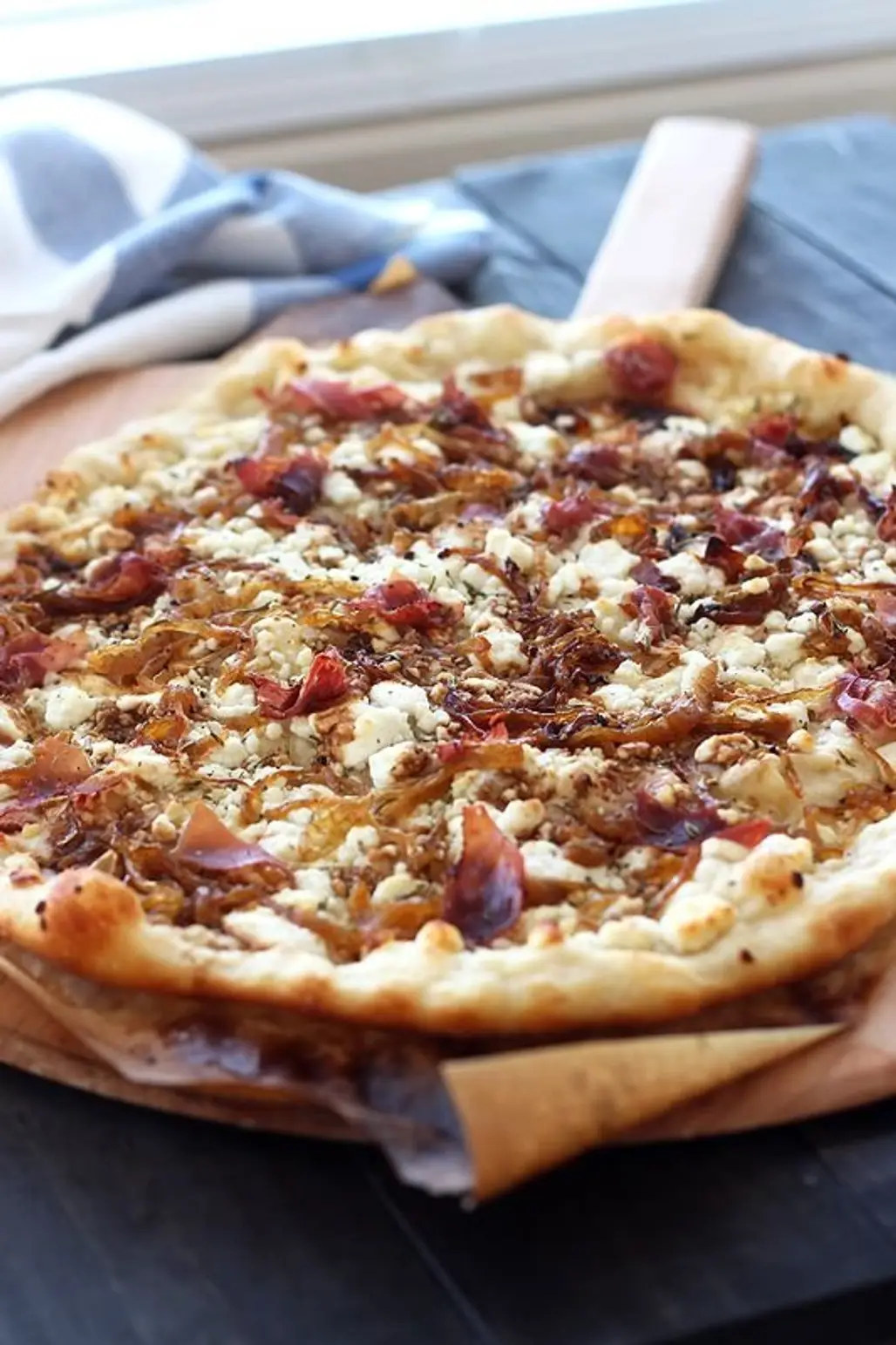 Caramelized Onion, Goat Cheese, and Prosciutto Pizza