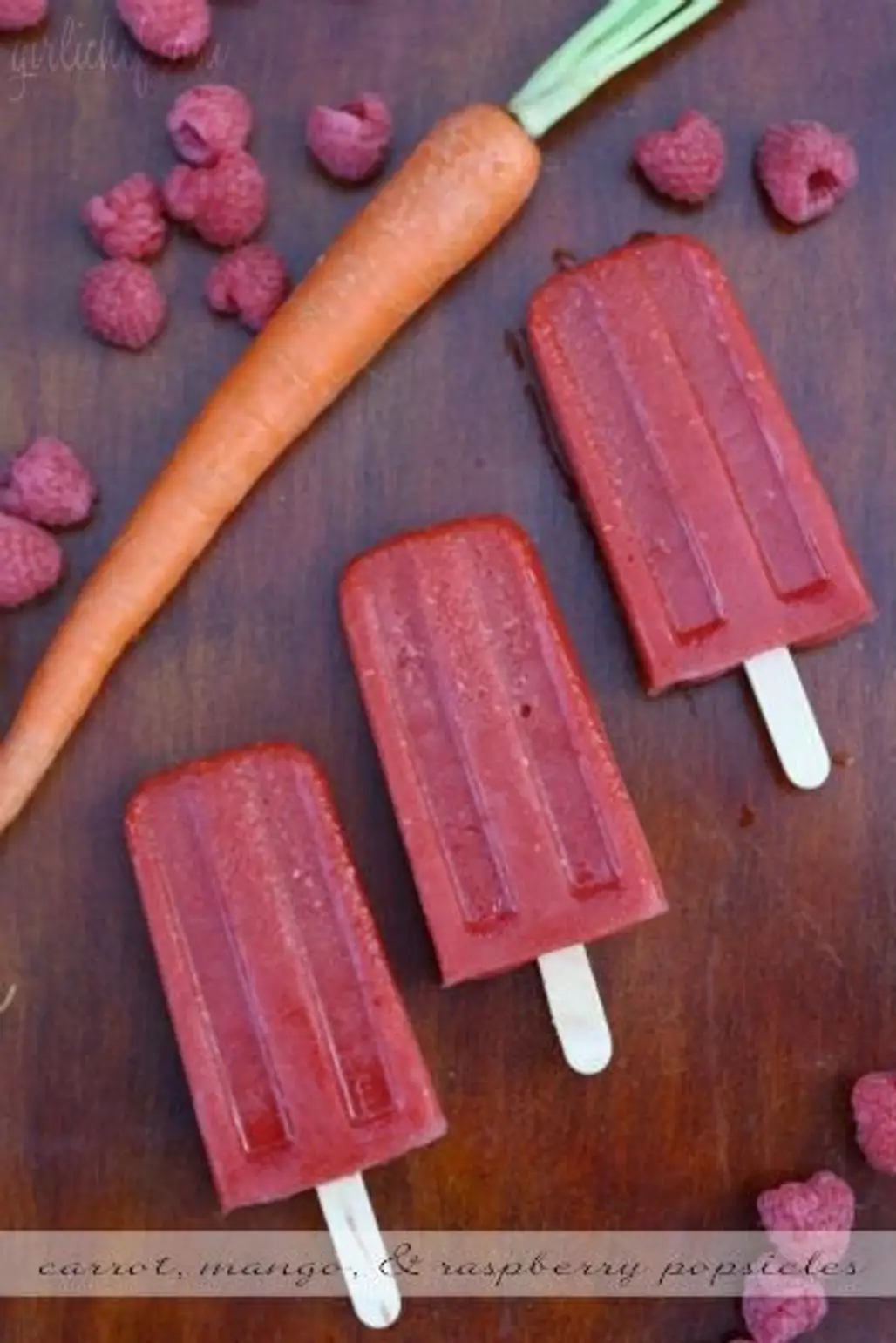 Carrot, Mango, and Raspberry Popsicle