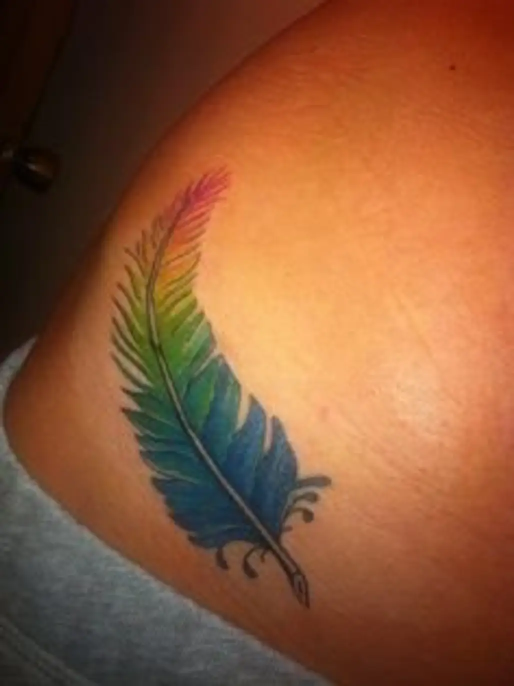 tattoo,arm,bird,wing,human body,