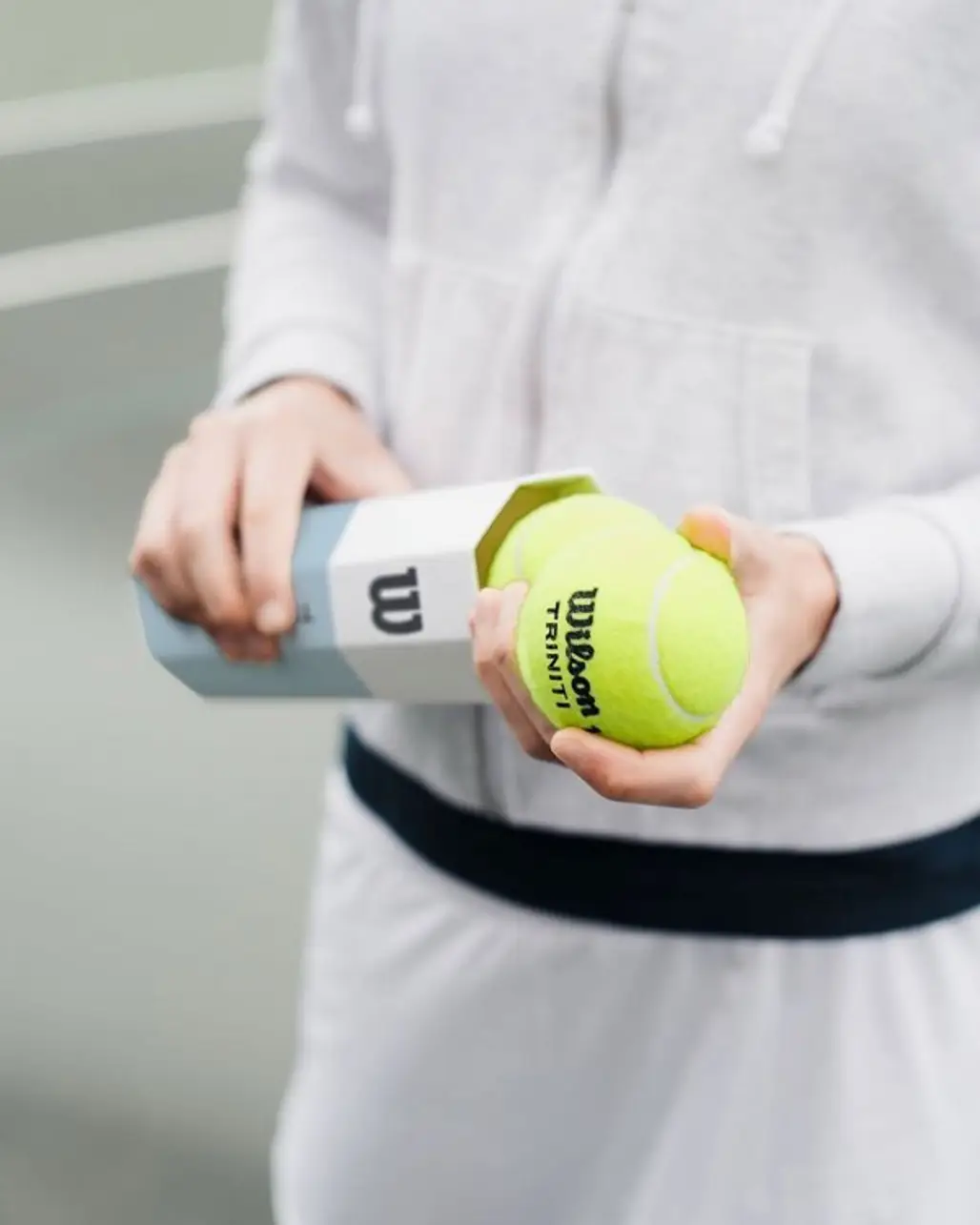 Tennis ball, Ball, Tennis, Arm, Sports equipment,