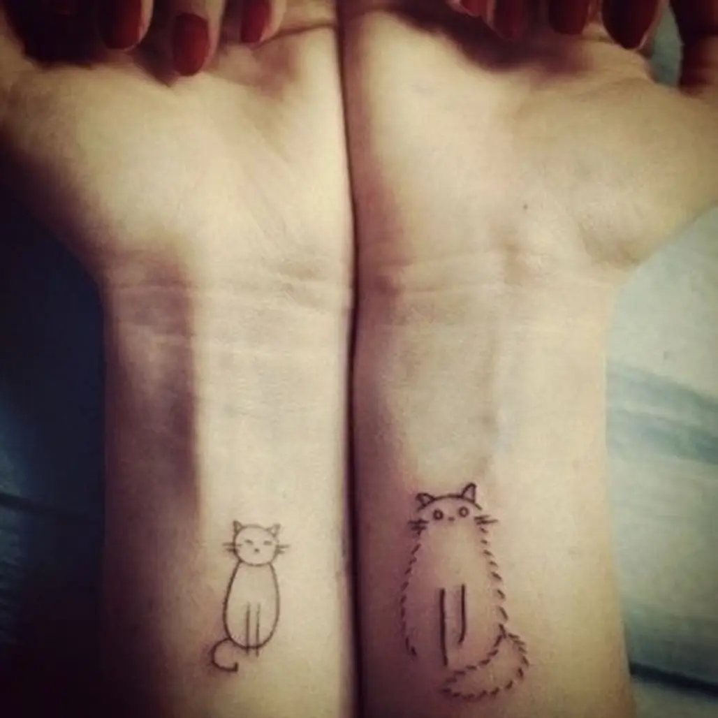 tattoo,finger,arm,skin,leg,
