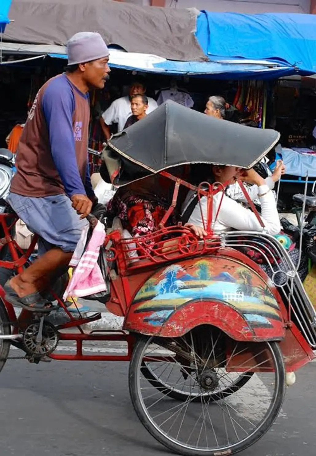 Ride in a Pedicab or Horse Drawn Carriage in Yogyakarta, Indonesia