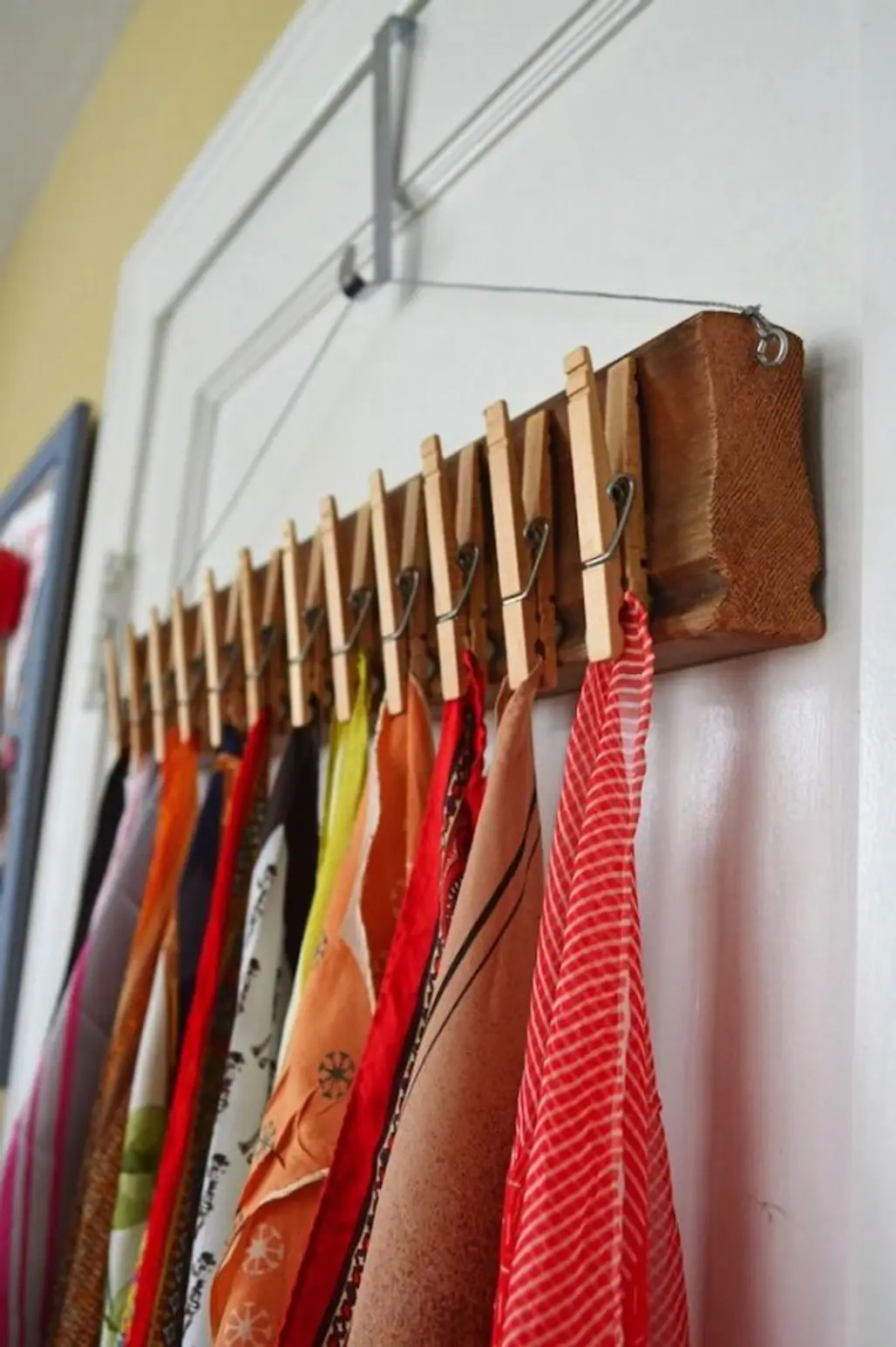 Hang Scarves by Clothespins to save Space
