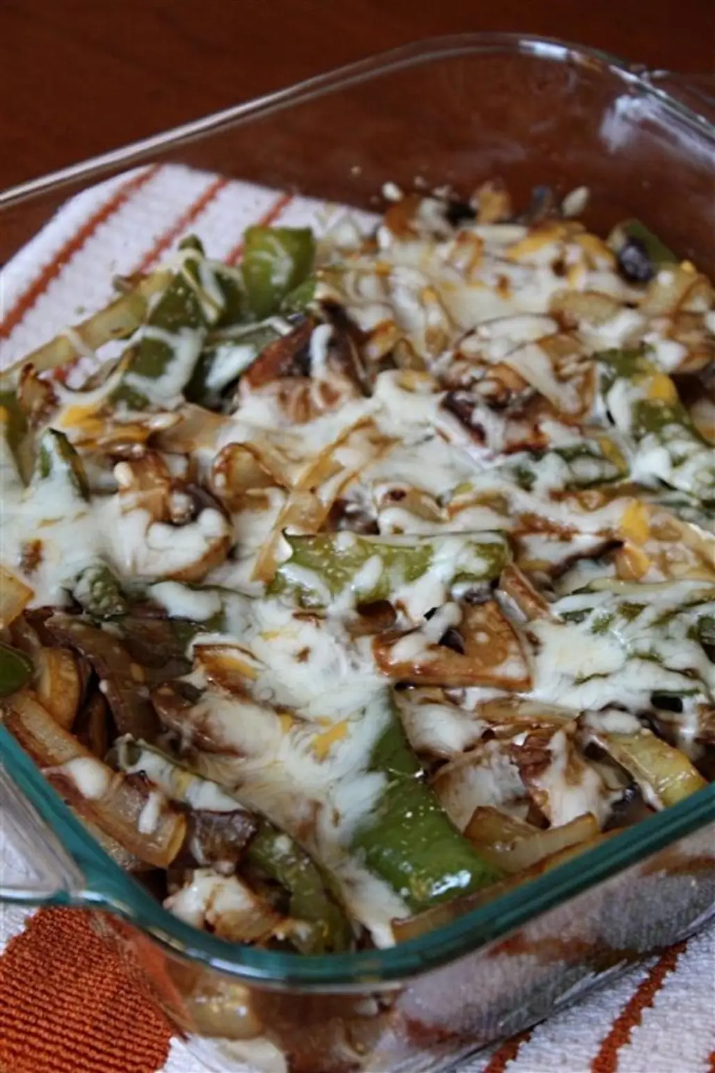 Smothered Chicken with Onions, Mushrooms, Bell Peppers, and Mozzarella