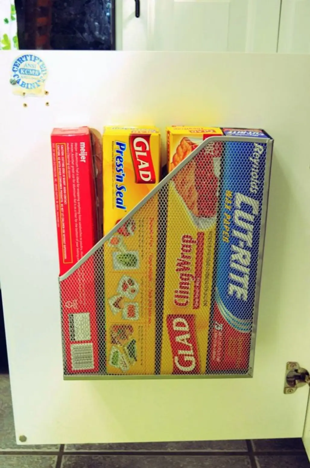 Use a Magazine Holder to Store Aluminum Foil and Cling-Wrap