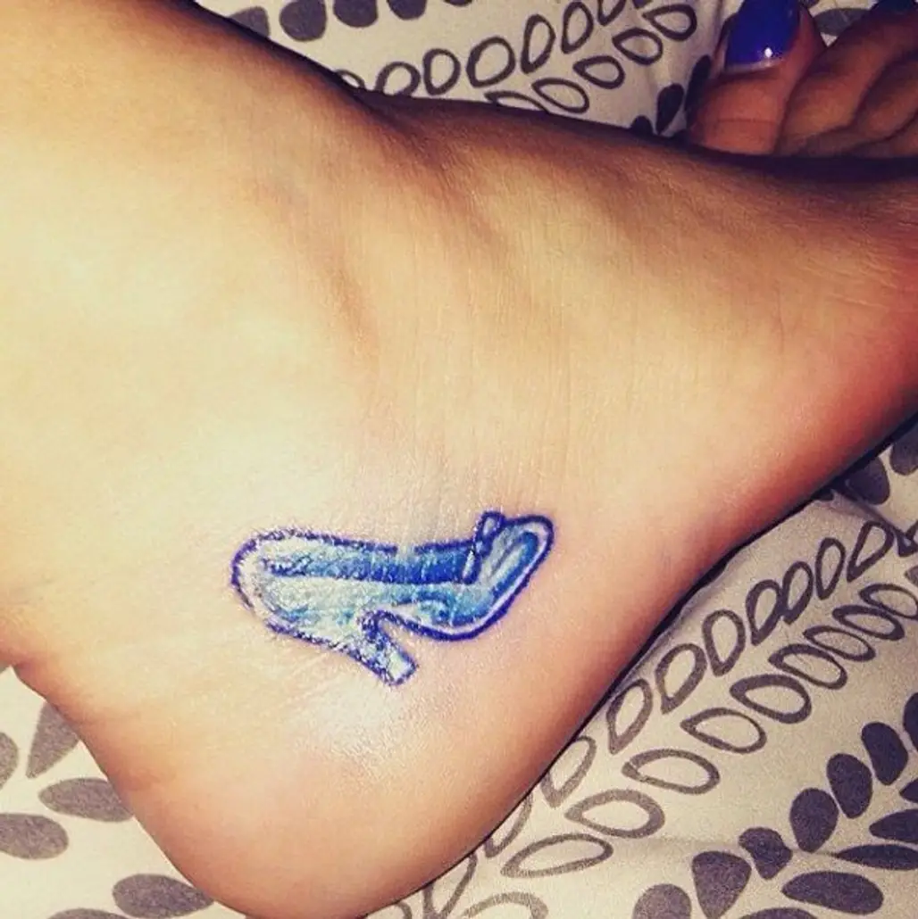 tattoo,arm,skin,finger,leg,