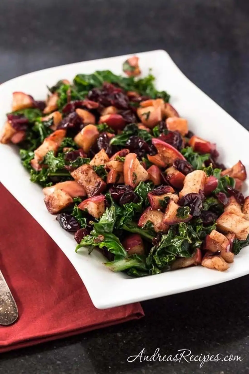 Warm Kale Salad with Dried Cranberries and Apples