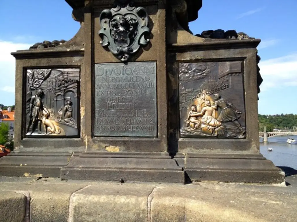 Touch the Sculpture of John of Nepomuk, Charles Bridge, Prague, Czech Republic