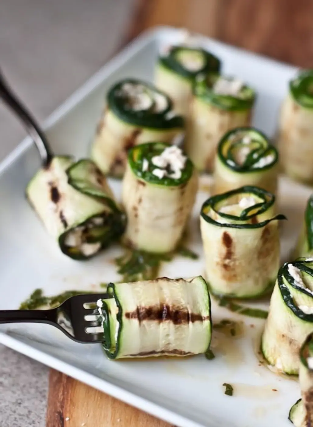 Zucchini Bites with Harissa, Goat Cheese, Lime and Mint