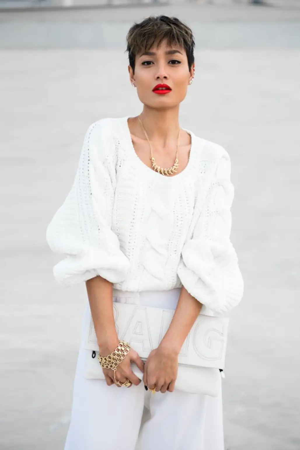 White with Gold Accessories and a Red Lip
