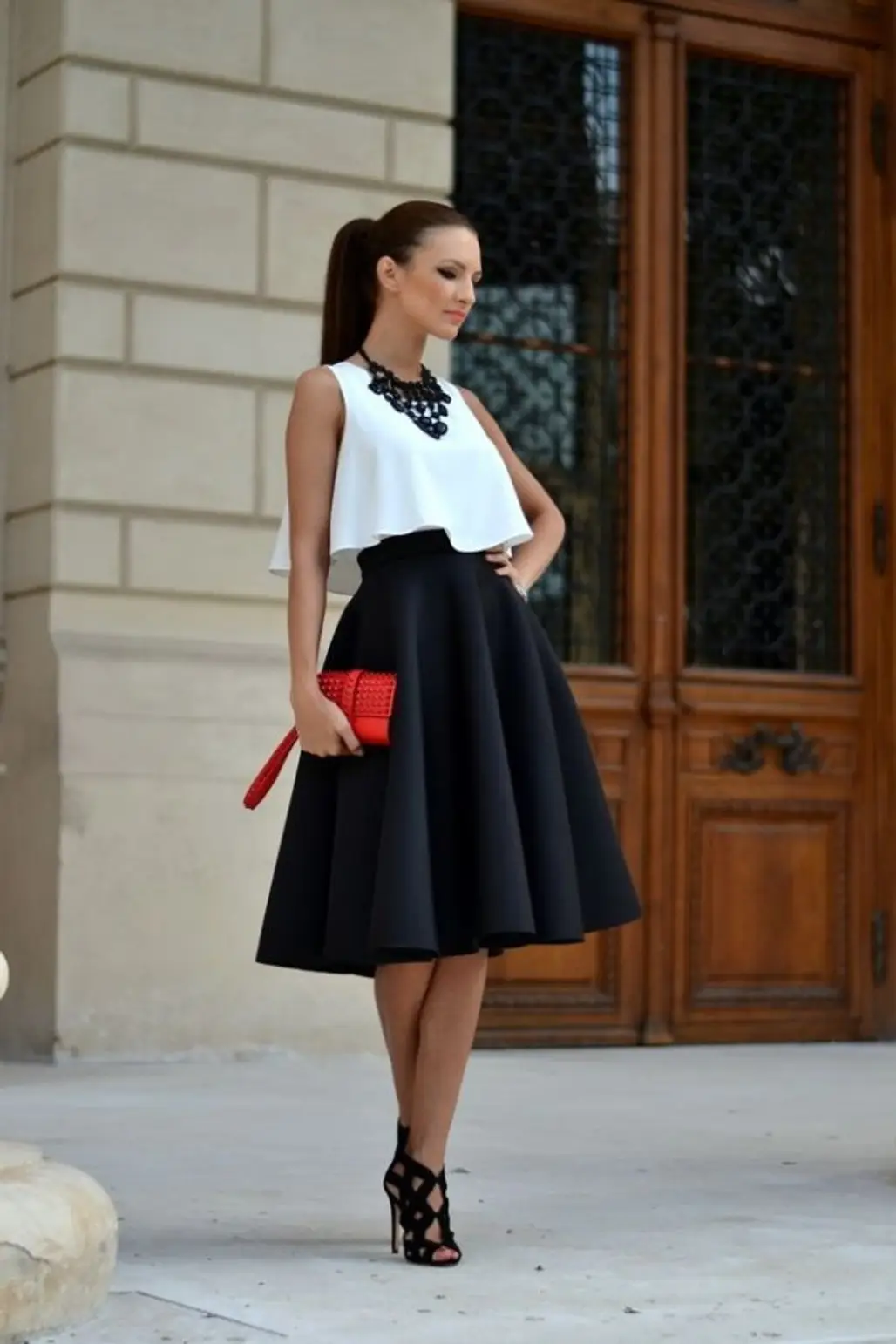 If You're Wearing This Skirt on Date Night, a Statement Piece is a Must. Let Your Bold Clutch or Necklace Be It