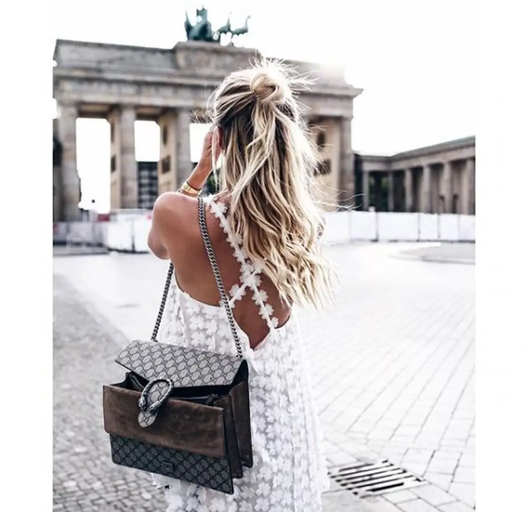 Brandenburg Gate, clothing, footwear, handbag, hairstyle,