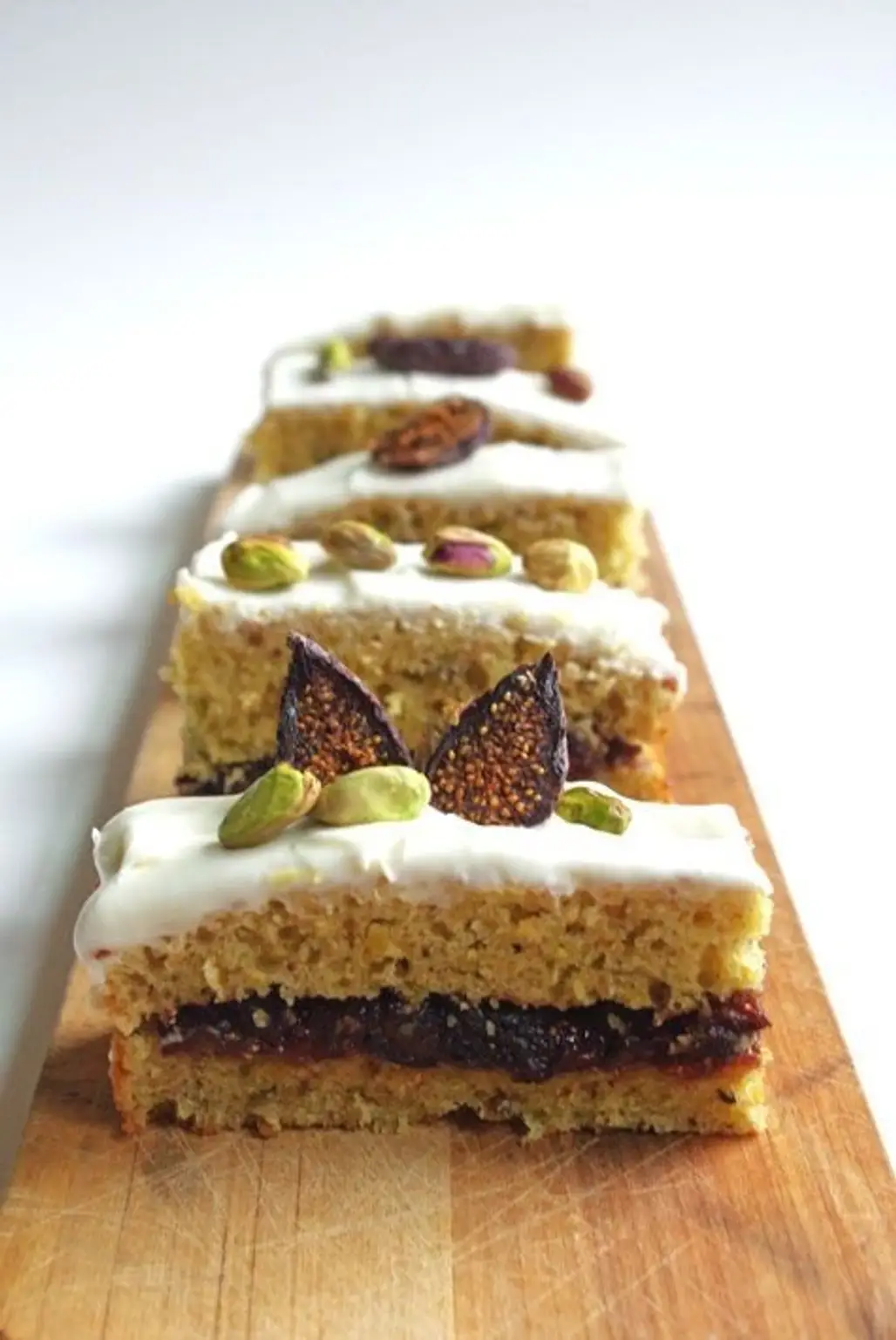 Pistachio Olive Oil Cake with Fig Compote Filling and Cream Cheese Frosting