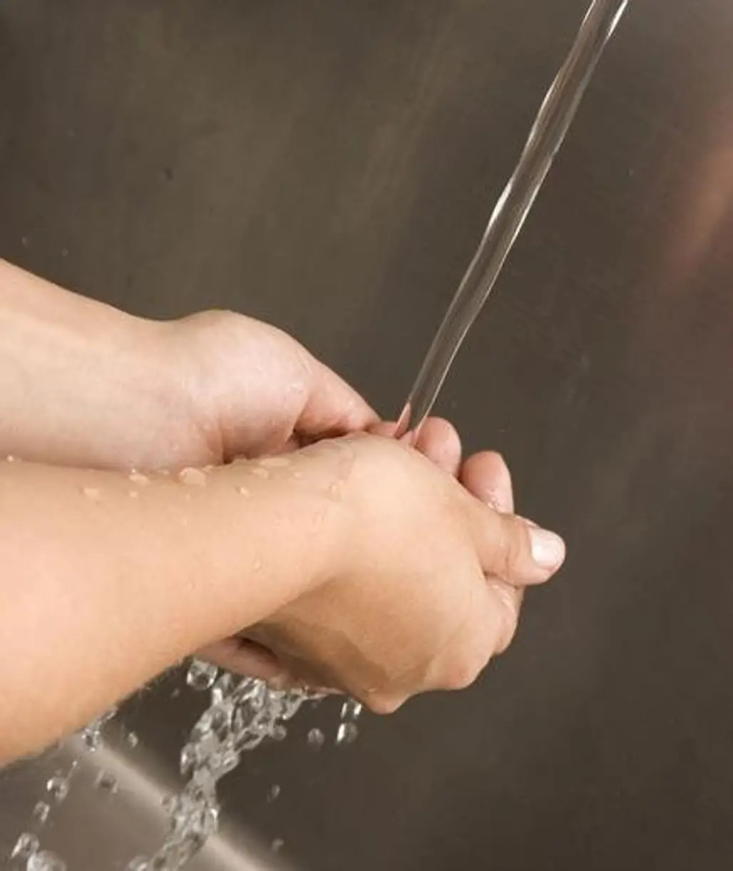 Cool down Quickly after a Sweat Session by Running Your Wrists under Cold Water