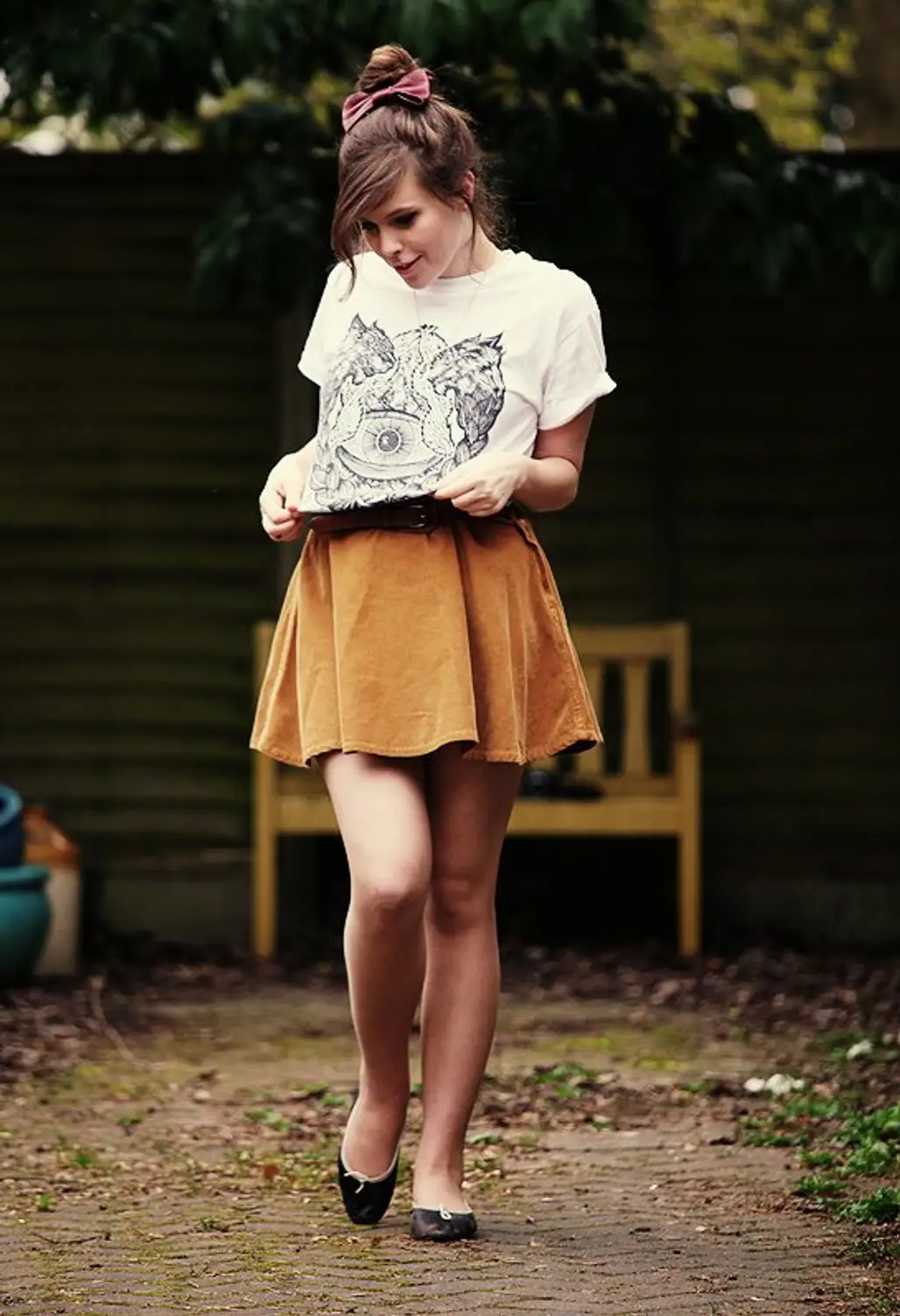 Pair Your Tee with a High-waisted Skirt or Shorts