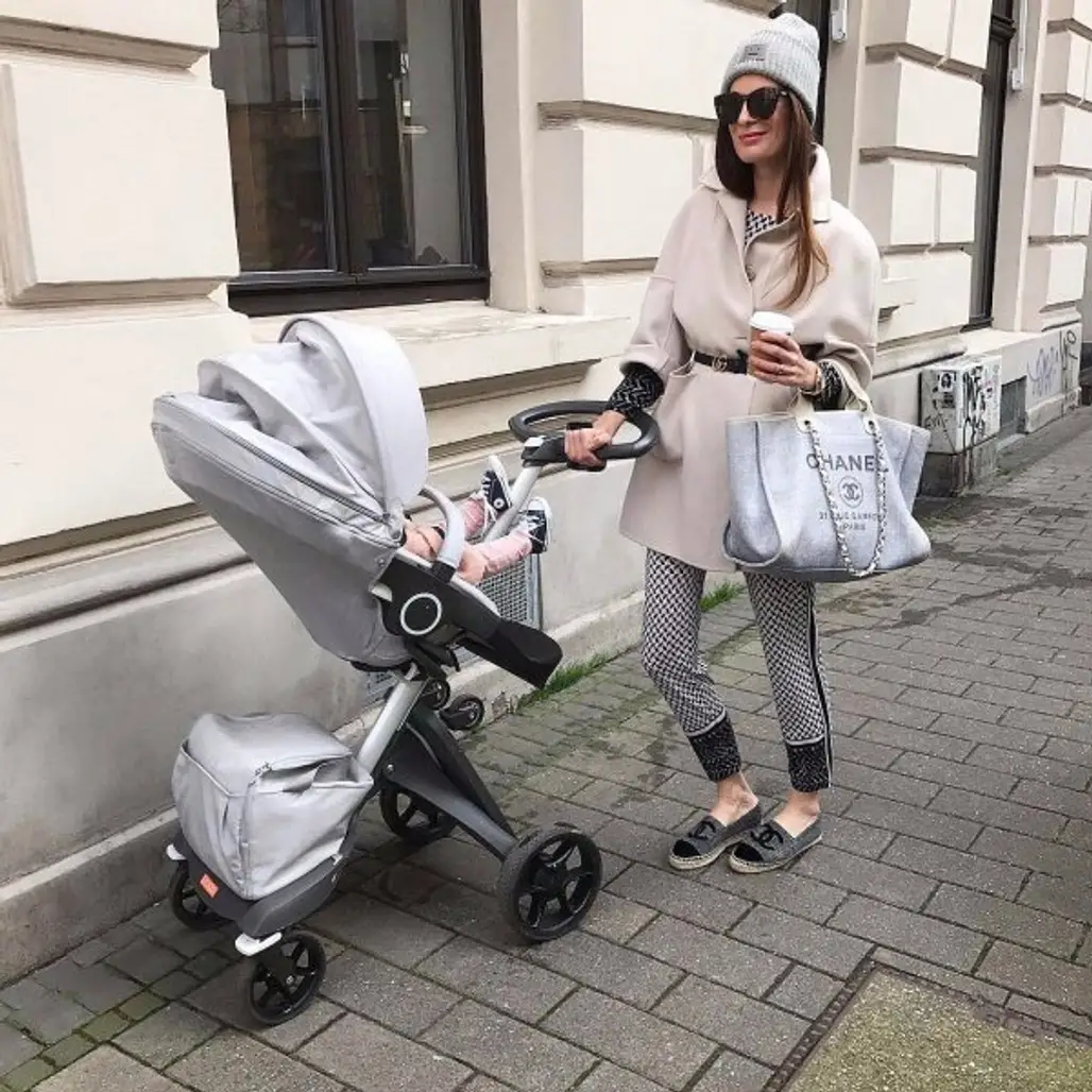 baby carriage, human positions, product, sitting, footwear,