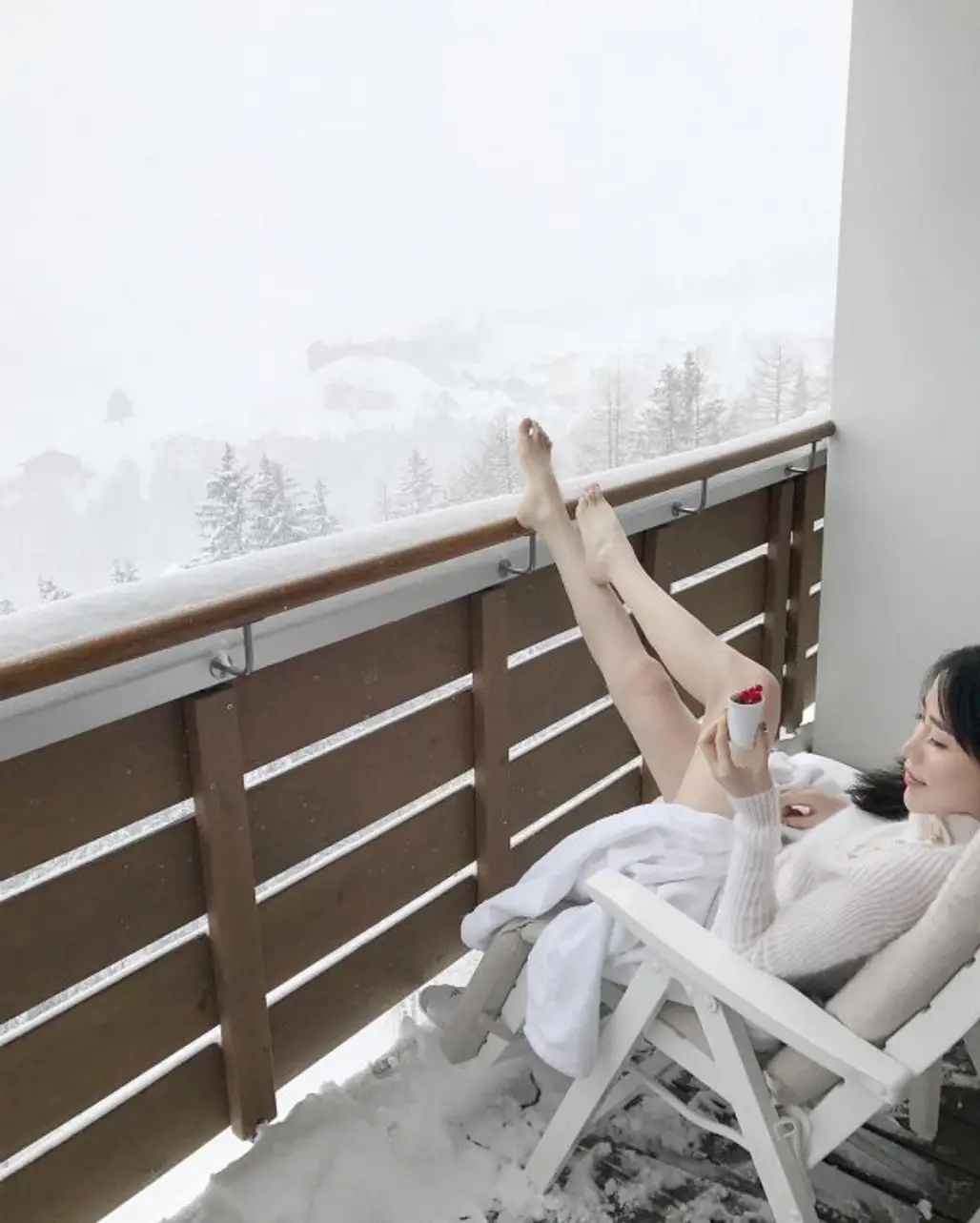 white, photograph, human positions, snow, sitting,