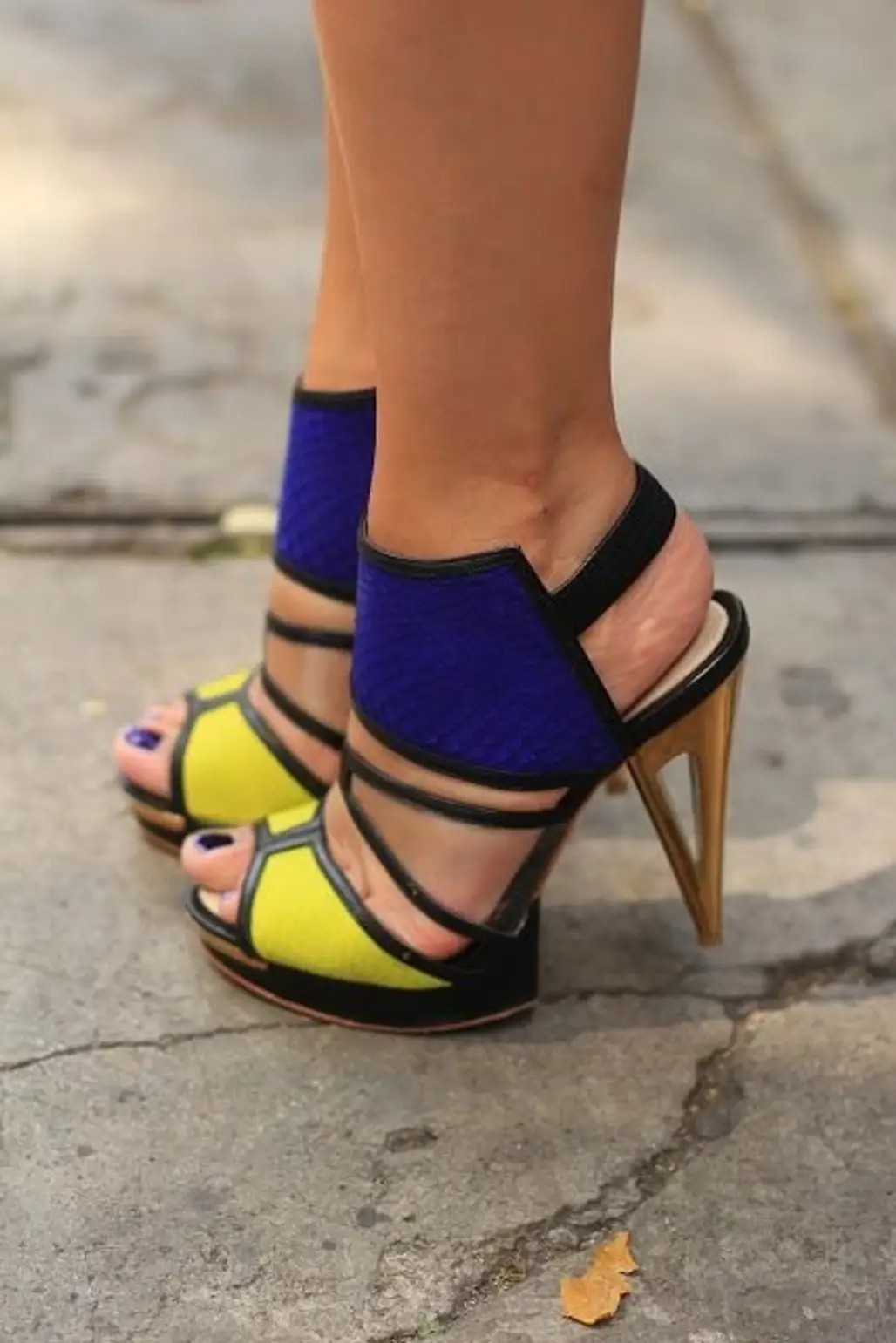 footwear,high heeled footwear,shoe,yellow,leg,
