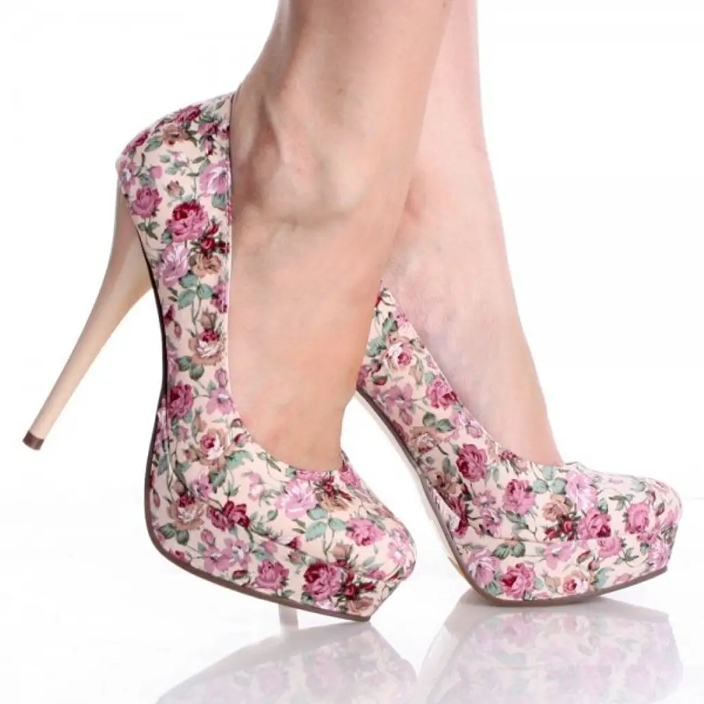 footwear,pink,high heeled footwear,shoe,leg,