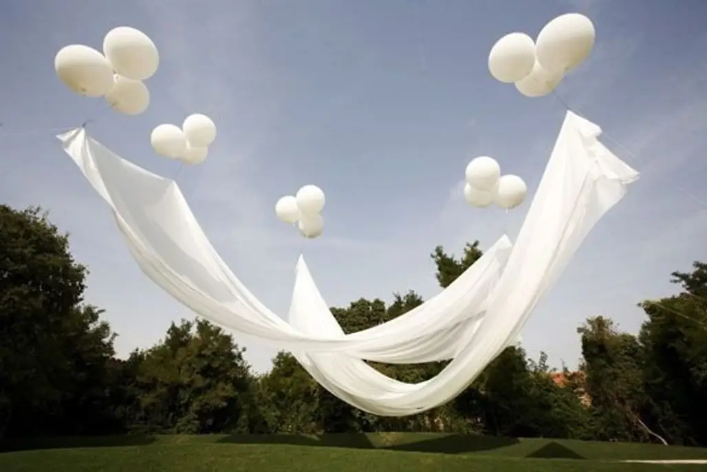 Floating Canopy: the Balloons Are Attached to the Ground with Fishing Line