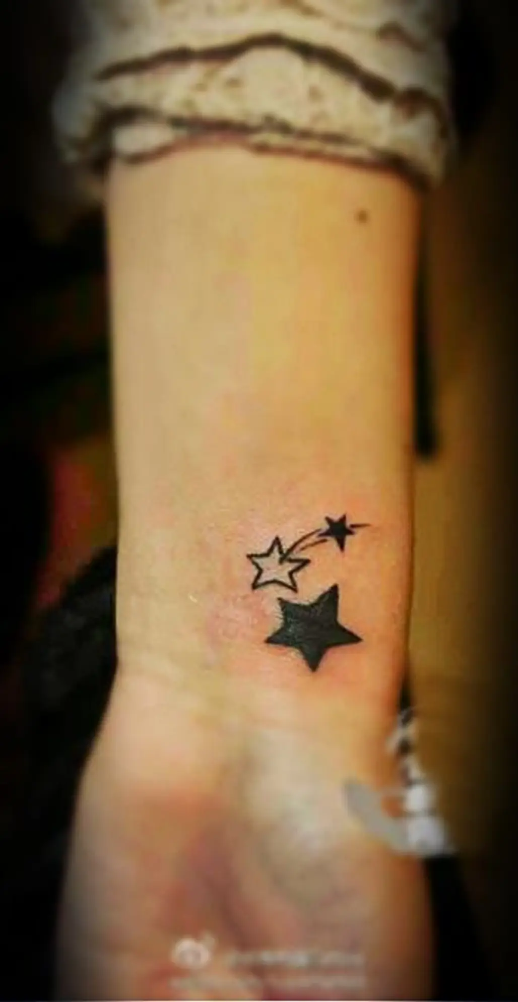 tattoo,skin,arm,close up,hand,