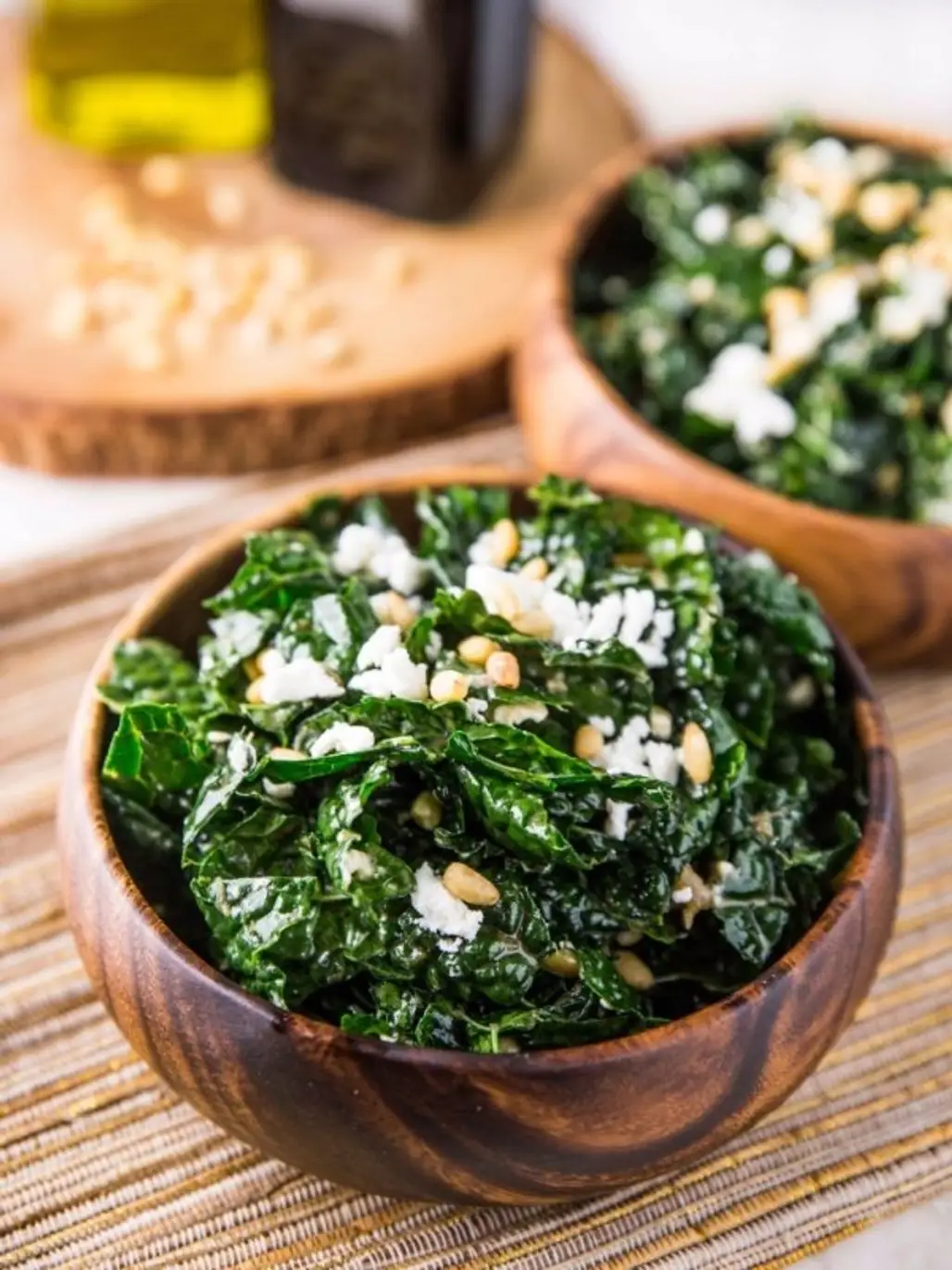 Warm Kale Salad with Goat Cheese, Pine Nuts and Sweet Onion Balsamic Dressing