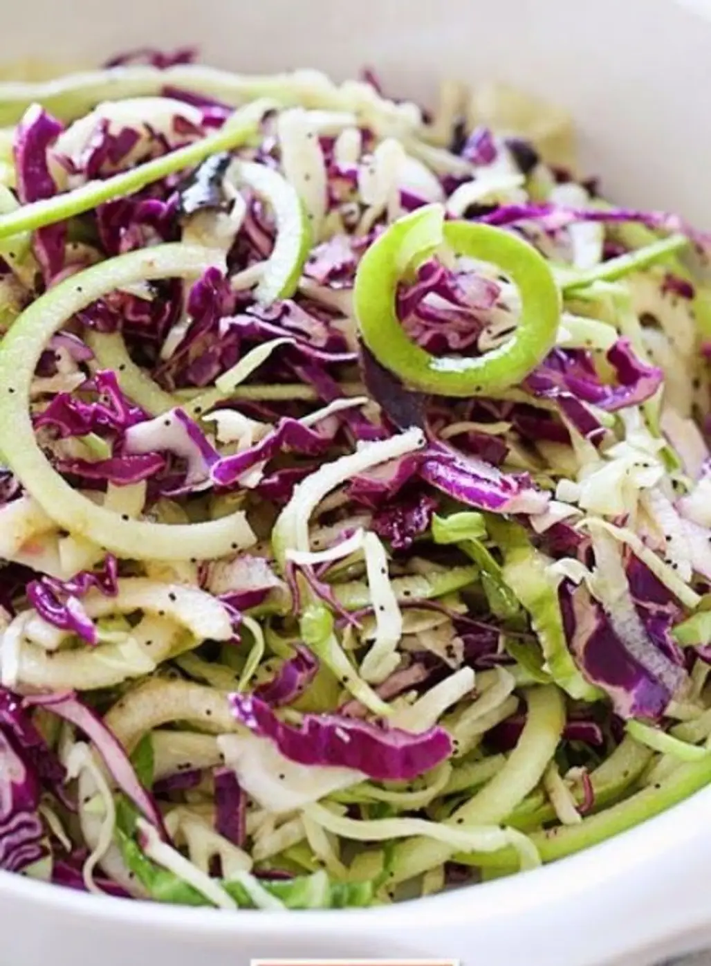 Spiralized Apple and Cabbage Slaw with Poppy Seed Dressing