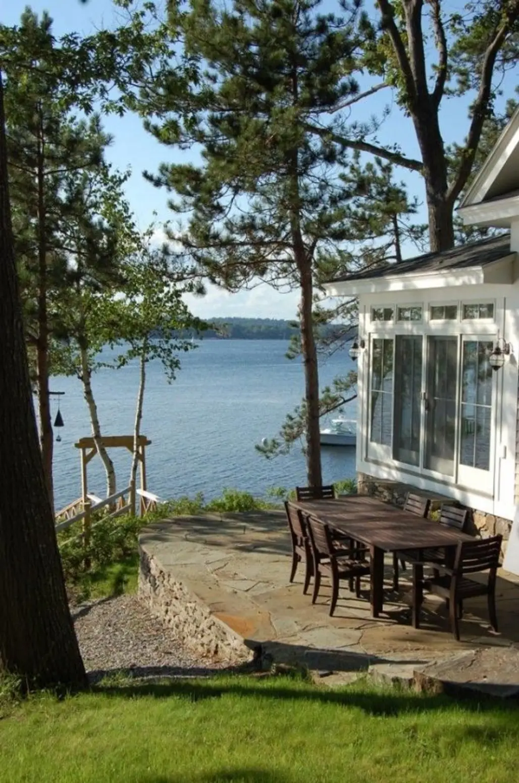 Dining outside is a Must at a Lakeside House
