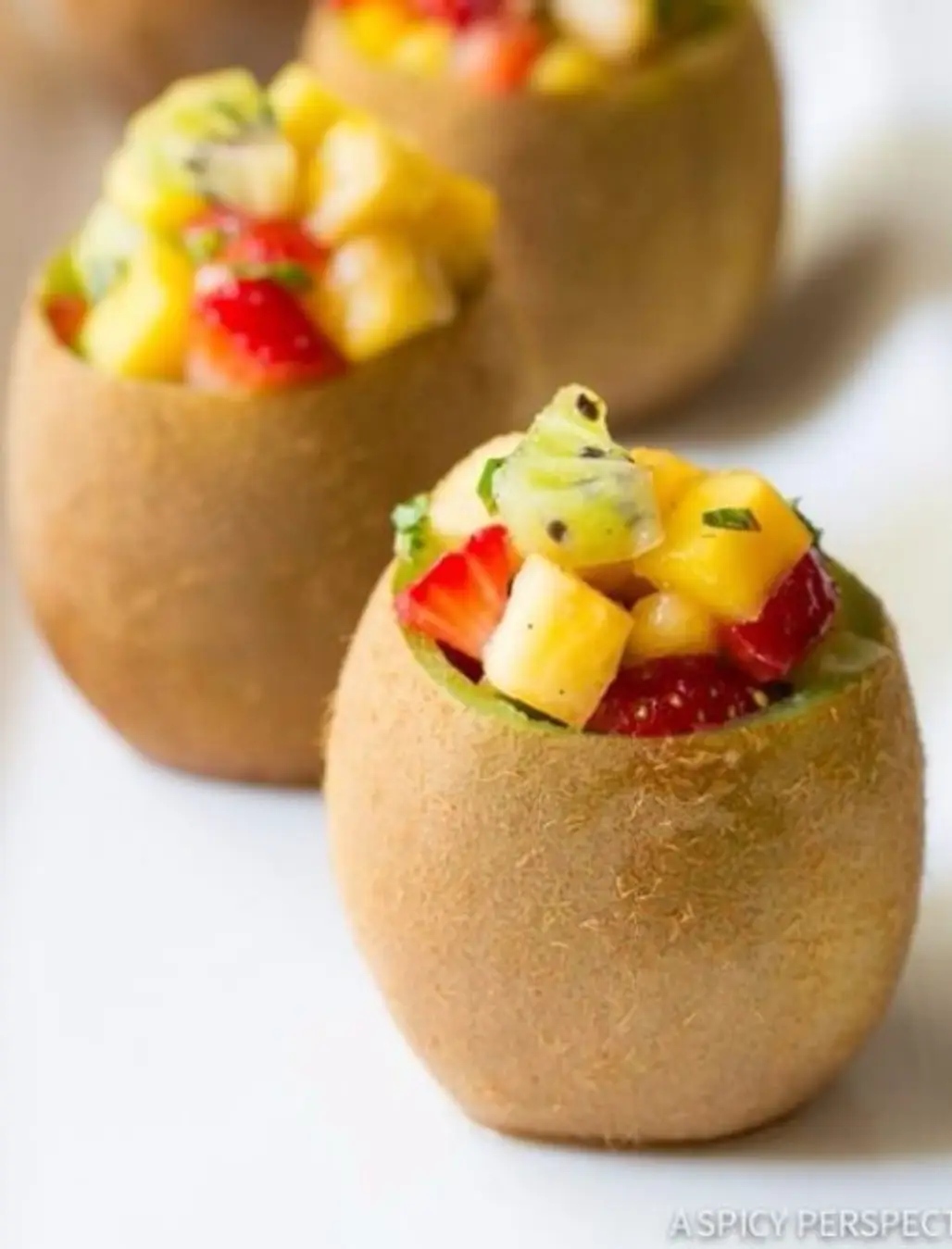 Tropical Fruit Salad with Vanilla Bean in Kiwi Cups