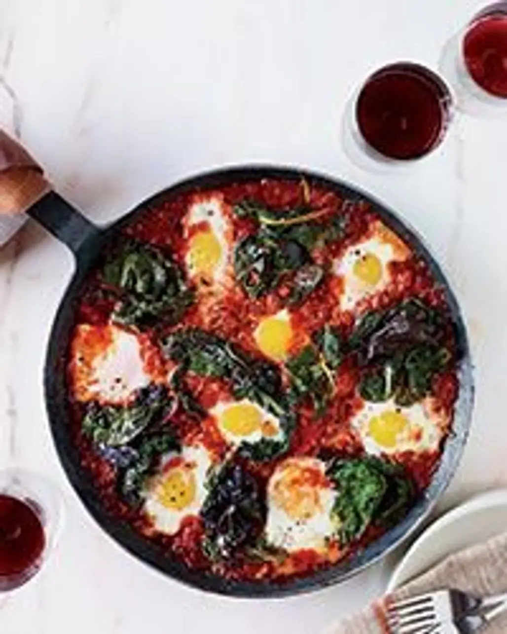 Baked Eggs in Tomato Basil Sauce with Swiss Chard