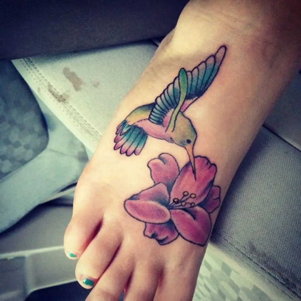 tattoo,arm,finger,flower,hand,