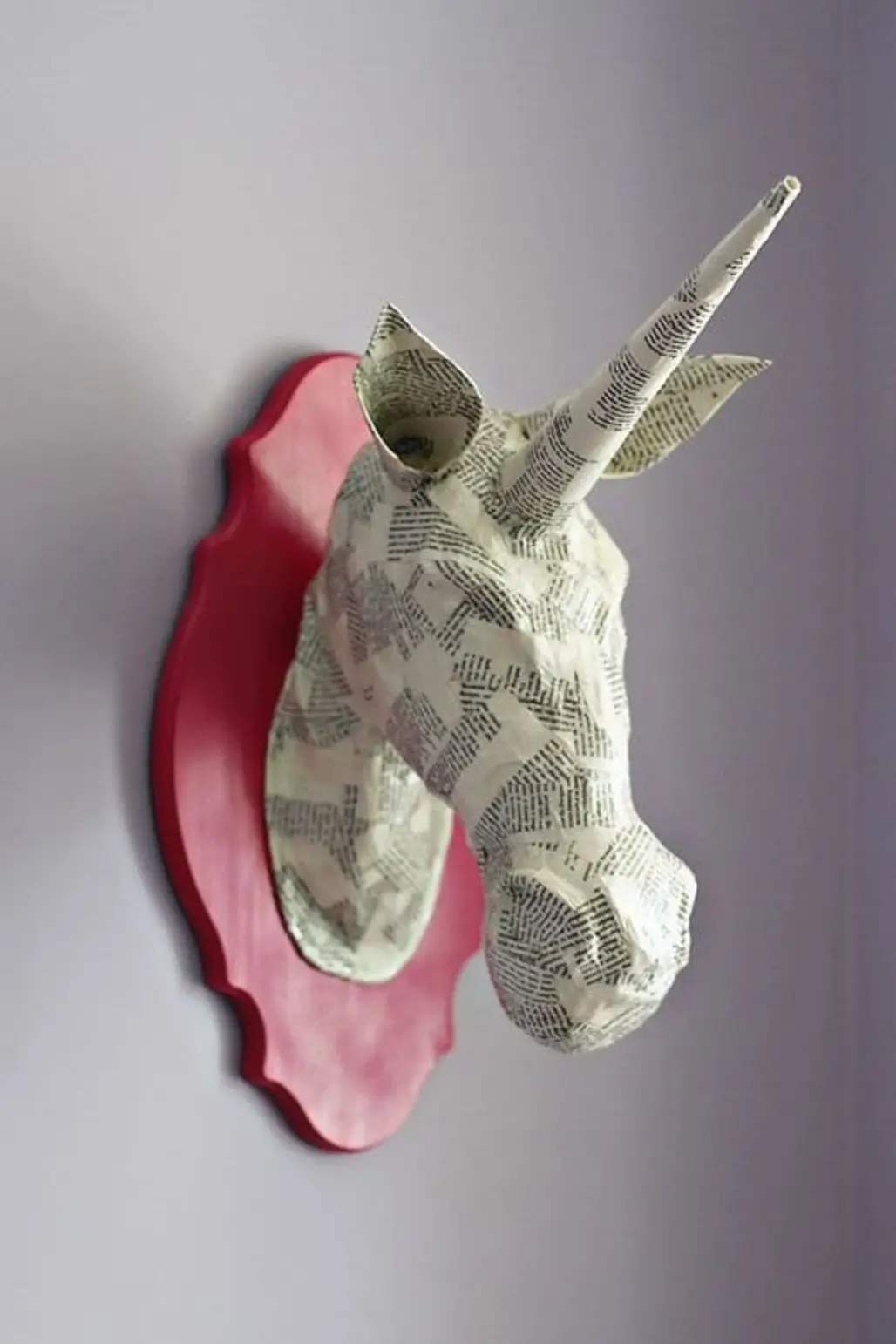 A Mounted Unicorn Head Made of Papier-mâché