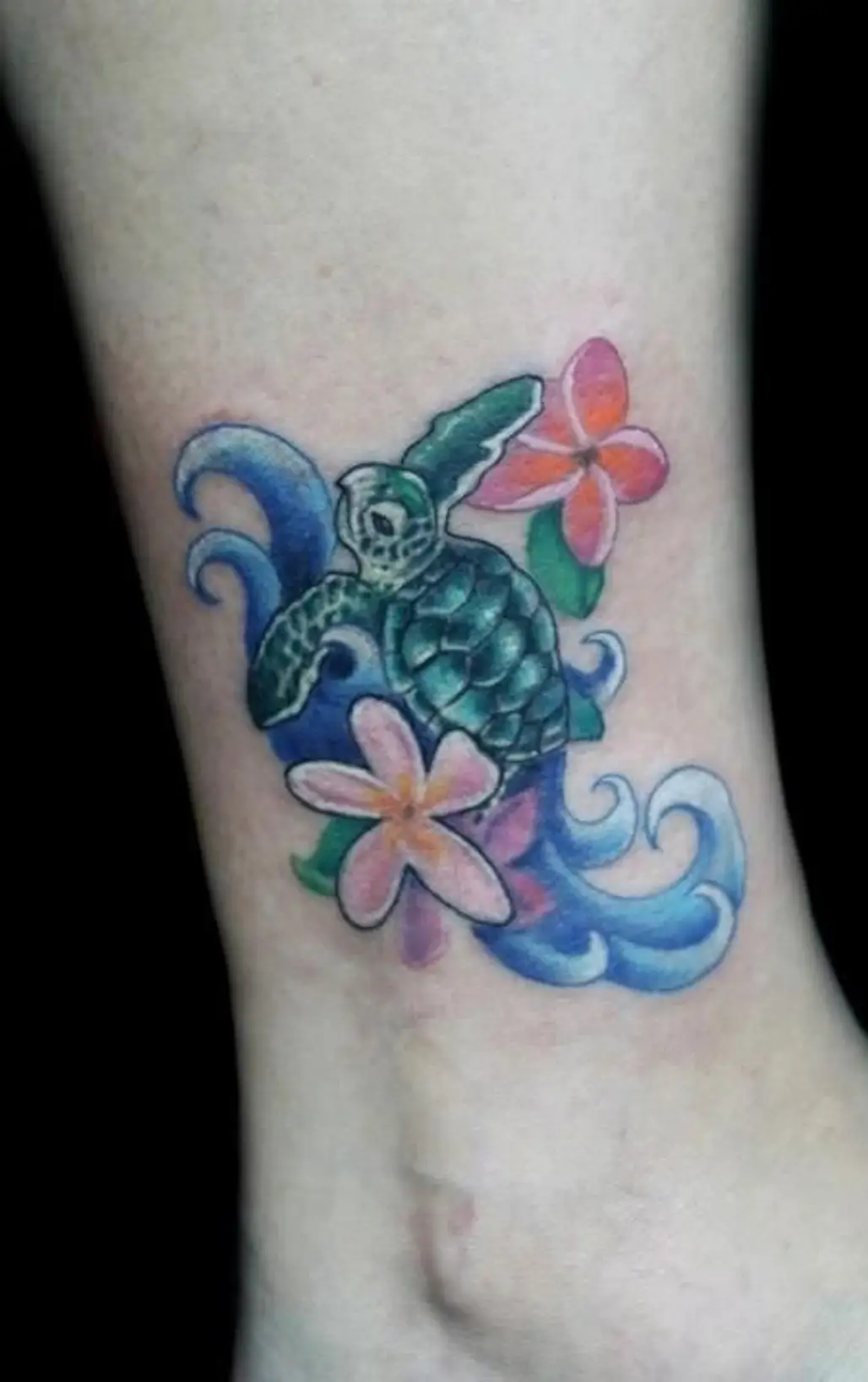 tattoo,arm,flower,hand,human body,