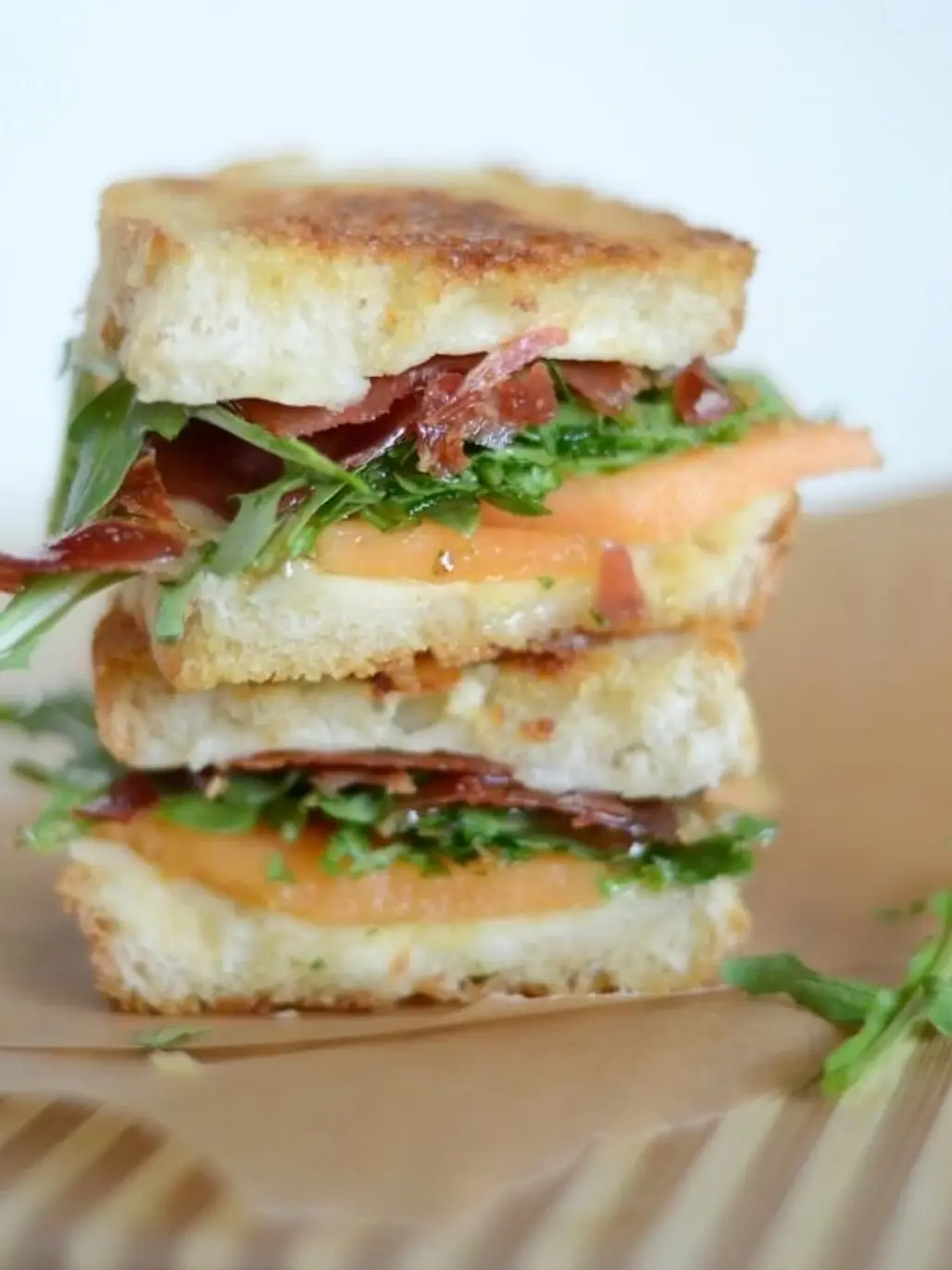 Crispy Prosciutto, Fontina & Melon Grilled Cheese with Arugula and Honey