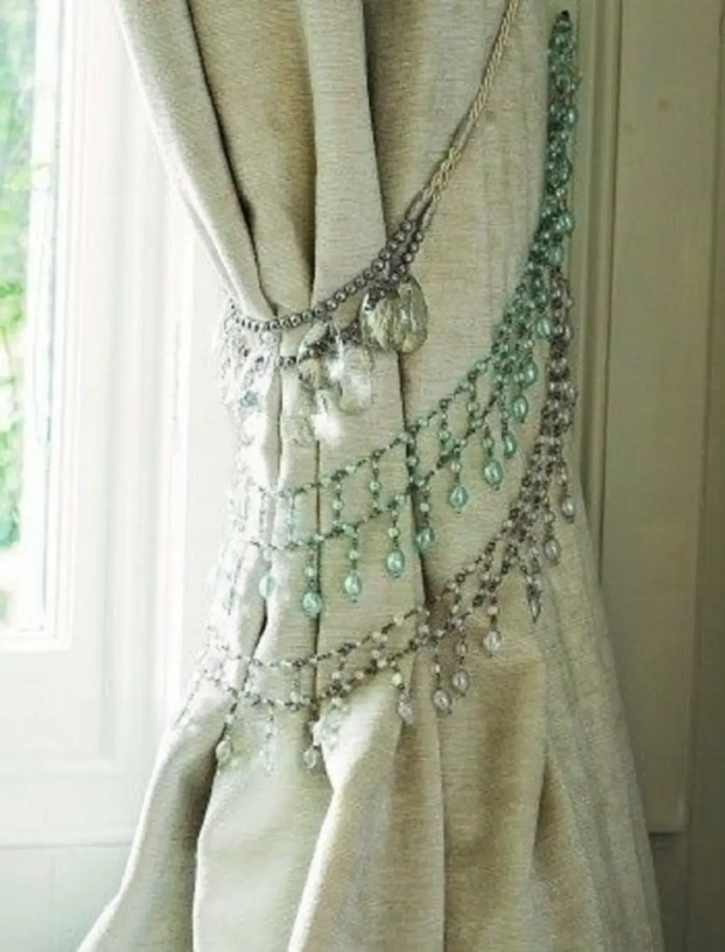 Tie Back Your Curtains with Old Necklaces and Bracelets