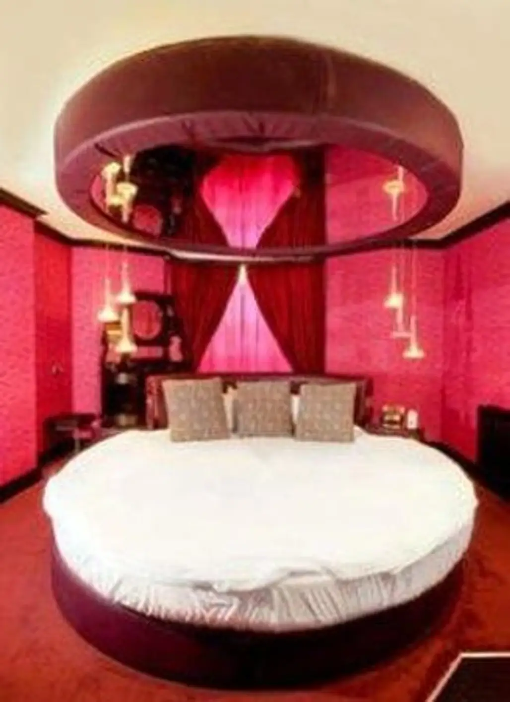 Enjoy an 8 Foot round Bed Complete with Overhead Mirror and Dance Pole in the Kraken's Lair at the Pelirocco Hotel, Brighton, UK